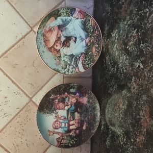 Collectible plates 2 of them multiple colored